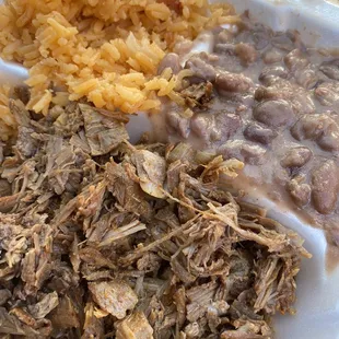 Birria plate full of yumminess! Rice and beans on the side with handmade tortillas!!!
