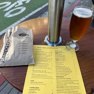 Mini Outdoor seating with heat lamp above. Marzen Beer on Tap.