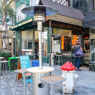 Order beer, wine and empanadas to go or enjoy them under our heated tables.