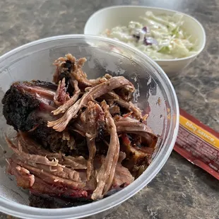Lunch. 1/2lb brisket, cole slaw and the only downfall? A packet of bbq sauce. Hrmm...