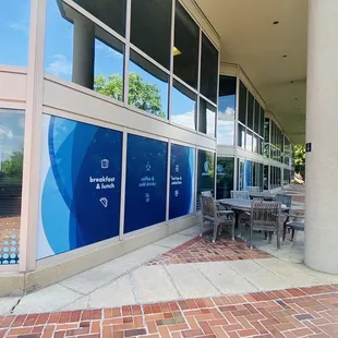 Outdoor tables &amp; chairs with peaceful river views