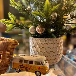 a toy van and a christmas tree