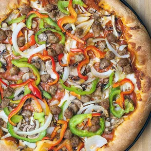 Monty&apos;s Revenge: Pepperoni, Italian sausage, fresh bell pepper medley, white onions &amp; &apos;shrooms