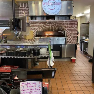 Look at that beautiful wood fire oven!