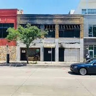a car parked in front of a building