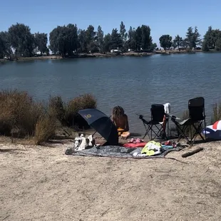 Relaxing right by the water. And dogs are allowed on leash.