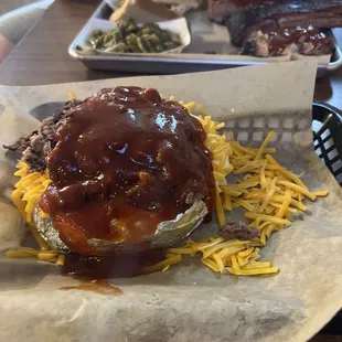 Loaded Meat baked potatoes. The one across is a 3 meat plate