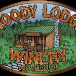the logo for woody lodge winery