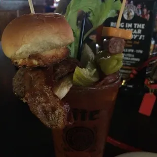 $10 Bloody that comes with a nice chaser, cheese, beef, pickle, and a cheeseburger with bacon and a fried egg!  Yum!!!