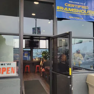 ows the entrance to the restaurant