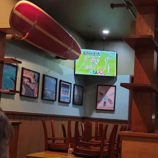 a surfboard on the wall