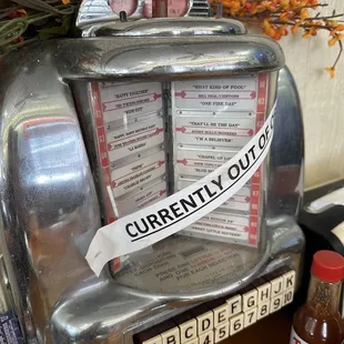 a juke box with a menu on it