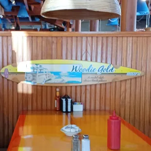 a surfboard hanging from the ceiling