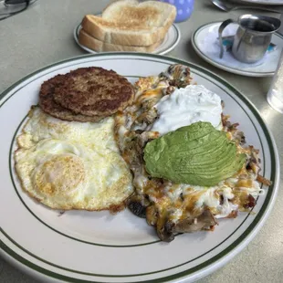 Eggs turkey sausage and woodys super spuds.