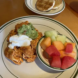 Chorizo and eggs with fruit. English muffin