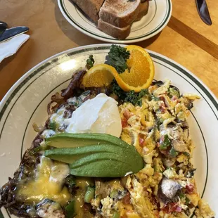 Cottage scramble with Woody&apos;s hash browns. Raisin toast.