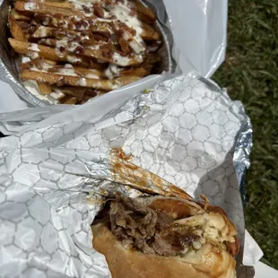 Woodys special, pulled pork coleslaw and onion rings with a side of loaded fries