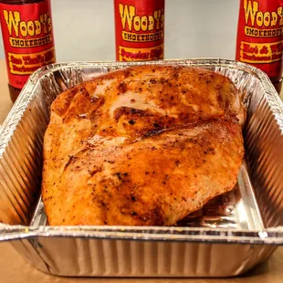 a turkey in a foil pan