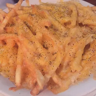 Cheese fries after I added pepper