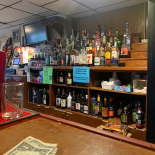 a bar with a lot of liquor