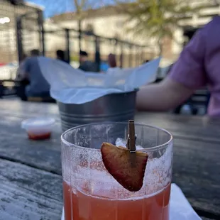 Seasonal spring cocktail - bourbon-based cocktail with sour beer and strawberry (I forget the name, but they are serving her up now)!