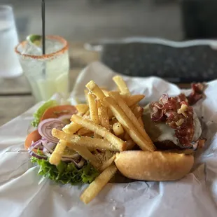 Burger with jalepeno jack and bacon, well done with Parmesan fries.