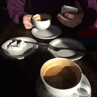 Coffee and empty plates because we ate too quick