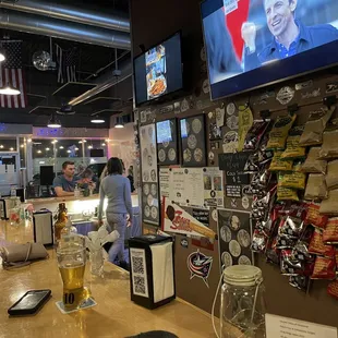 a man and a woman at the bar