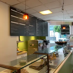  woman working behind a counter