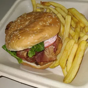 Fried chicken with bacon with French fries