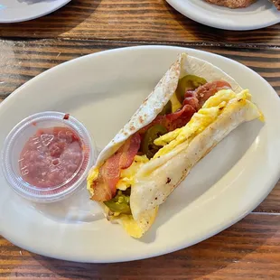 Breakfast taco (bacon and jalapeño additional)- comes with salsa!