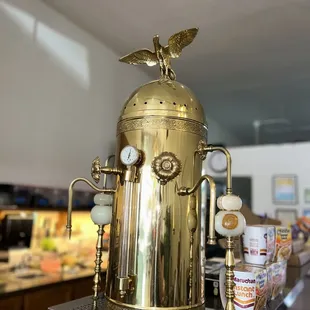 I think this is some sort of vintage coffee maker siphon? Very cool.