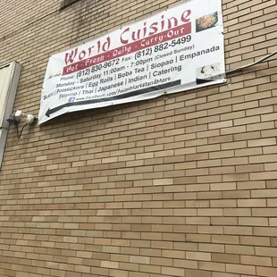 a sign on the side of a building