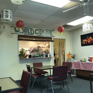 a restaurant with tables and chairs