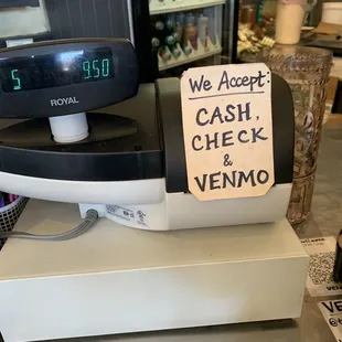 Cash only ATM inside for convenience.