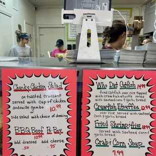 two menus on a counter