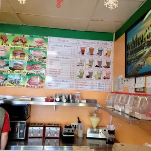 a man standing in front of a counter