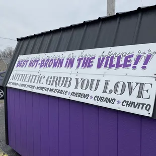 a sign on the side of a building