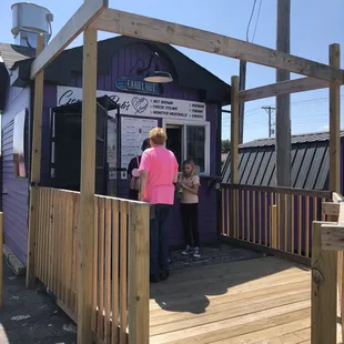 two people standing outside