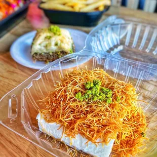 Osmaliye (ashta cream topped with fried shredded kataife dough , pistachio and drizzled with rose water sweet syrup) (IG: vetteats)