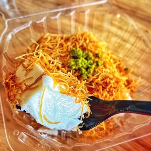 Osmaliye (ashta cream topped with fried shredded kataife dough , pistachio and drizzled with rose water sweet syrup) (IG: vetteats)