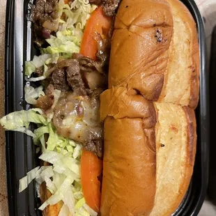 Steak and cheese sub. Really good the bread soaks up the Sauce and holds up well. Definitely will be back n order again.