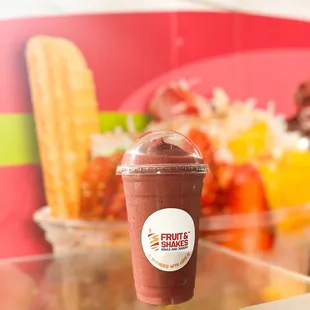 a smoothie in a plastic cup