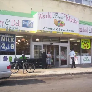 a man standing in front of the store