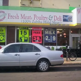 a car parked in front of the store