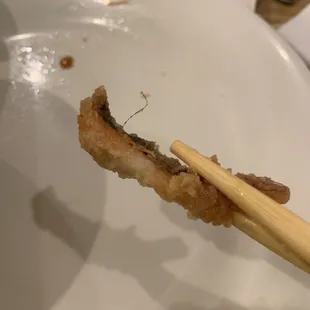 Hair on the deep fried squid.