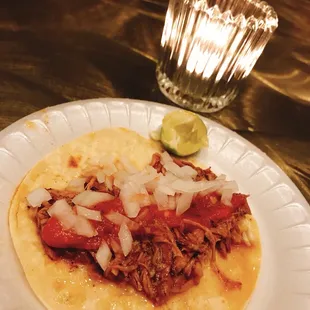 This taco from abuelas is ridiculously good. Authentic Birria de chivo (goat) was so moist and her salsa was bomb.com