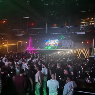 a large group of people dancing