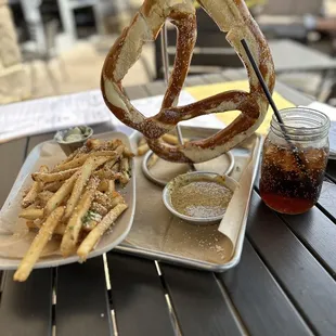 a pretzel and french fries