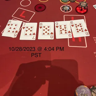 Victory Coin and the Royal Flush Medallion on my jeans belt loop